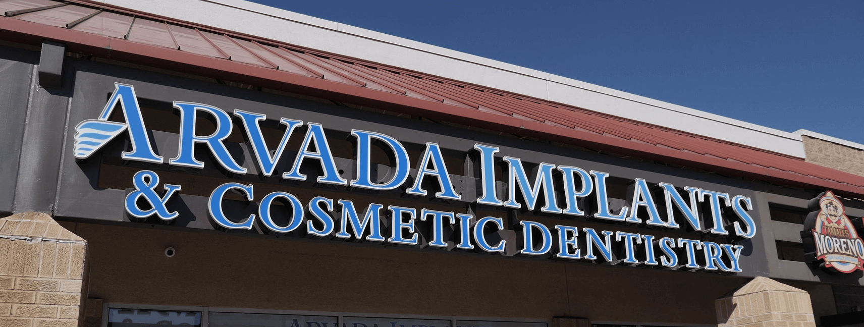 Arvada Implants and Cosmetic Dentistry Logo Banner