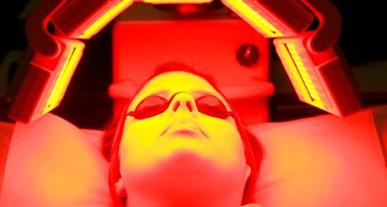 Red light therapy session on the face
